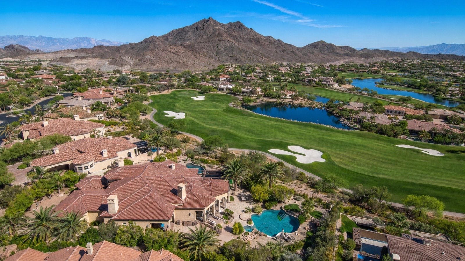 Anthem Country Club Henderson Nevada golf course with guard-gated luxury community homes and Mountain backdrop showing the lifestyle and location of south Henderson